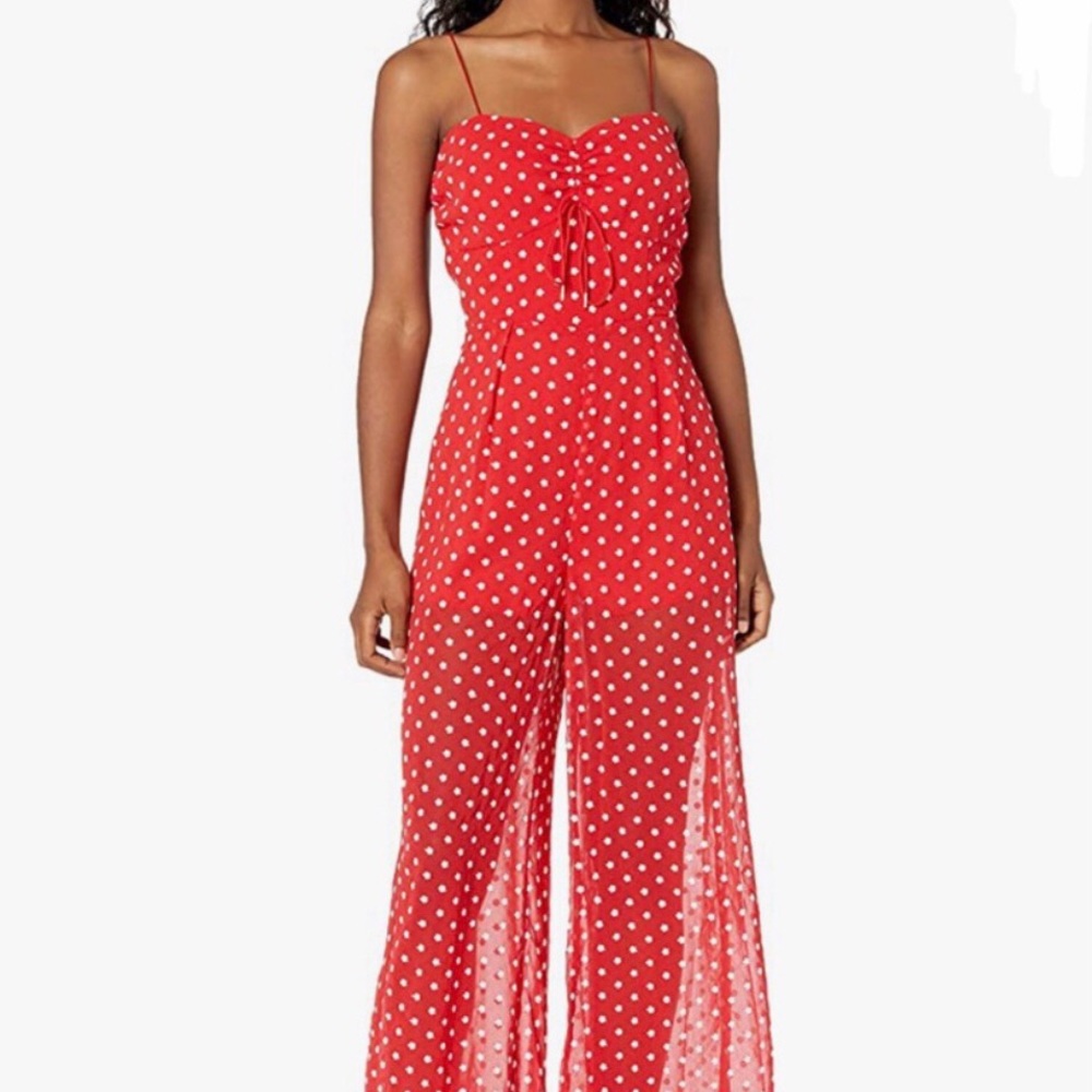I am selling a red with white flowers pantsuit/romper that is very flattering on